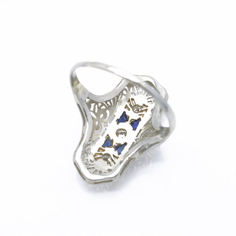 The 186th Avenue: Camphor Glass and Baguette Cut Sapphire